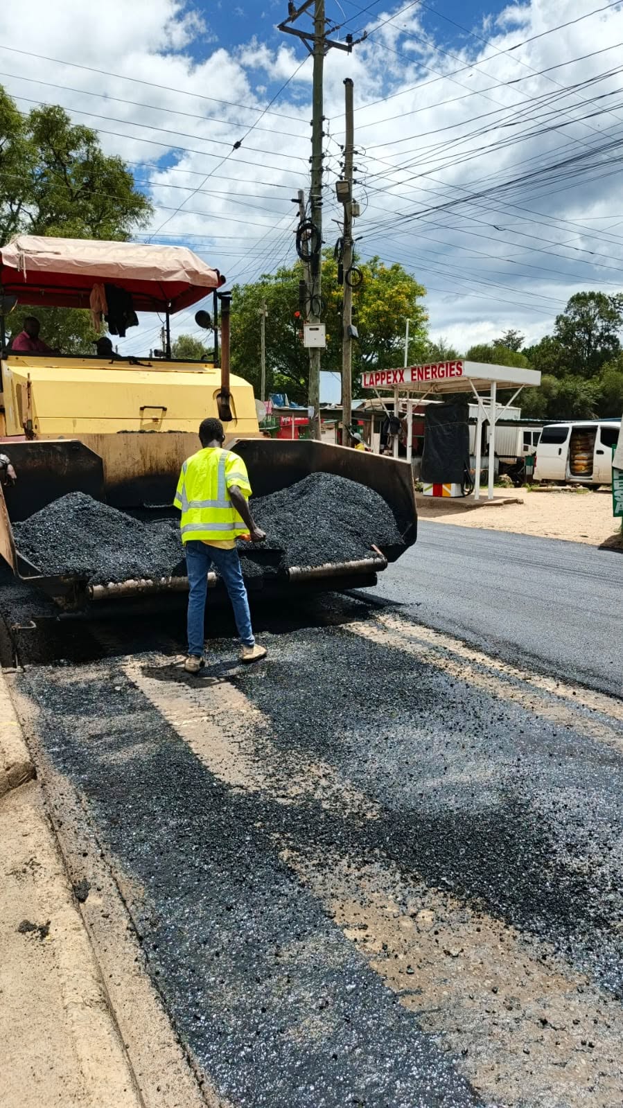 Asphalt paving and roller compaction at a coffee farm